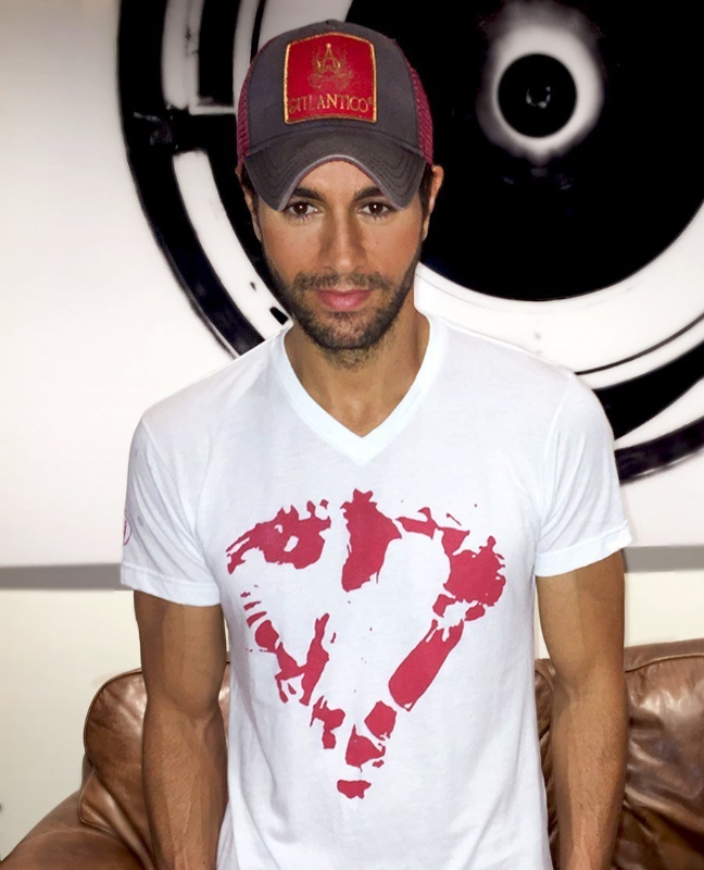 Enrique Iglesias sporting his new "heart" T-shirt. All net proceeds from sales of the T-shirt will go to help kids in times of crises. Photo by Al Silfen (PRNewsFoto/Save the Children)